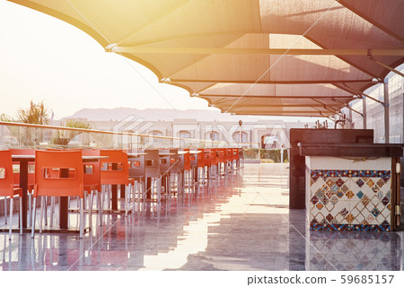 Empty terrace with a table and chairs outdoor Empty terrace with a table and chairs outdoor 59685157