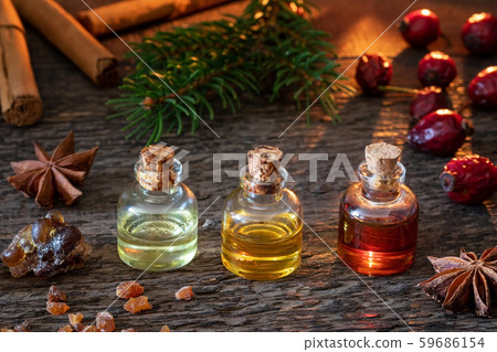 Christmas mix of essential oils with frankincense, myrrh, cinnamon, spruce and dried rose hips 59686154