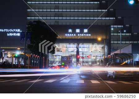 Osaka Station and light trails of cars Osaka Station and light trails of cars 59686250