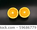 Organic freshness Orange fruit cutting taste sweet and sour on isolate black background  59686779