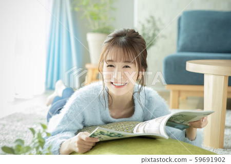 Ladies living room magazine book read prone Ladies living room magazine book read prone 59691902