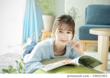 Ladies living room magazine book read prone 59691903