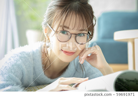 Ladies living room magazine book read prone 59691971