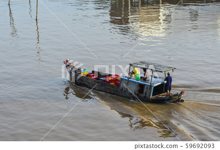 A motorboat running on Mekong River A motorboat running on Mekong River 59692093