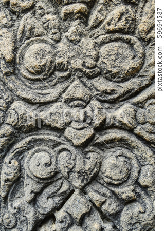 Khmer art sculpture on sand stone in Prasat Muang 59694587
