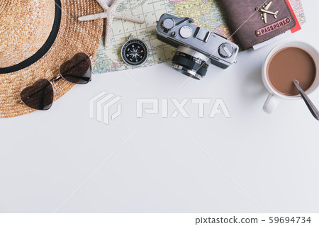 Travel accessories and items with cup of coffee on 59694734