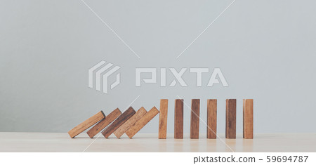 Stop wooden domino business crisis effect or risk protection concept Stop wooden domino business crisis effect or risk protection concept 59694787
