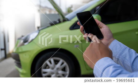 man Using a mobile phone call to assistance Help man Using a mobile phone call to assistance Help 59695681