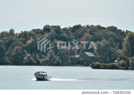 Speedboat in lake Ontario in autumn. Colourful 59698100