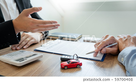 agent broker man holding document showing an 59700408