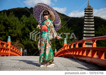 A young woman in kimono A young woman in kimono 59703748