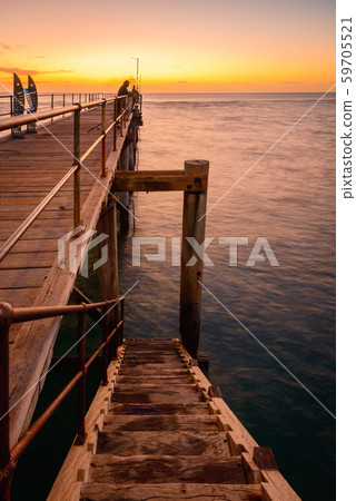 People fishing off Port Noarlunga jetty People fishing off Port Noarlunga jetty 59705521