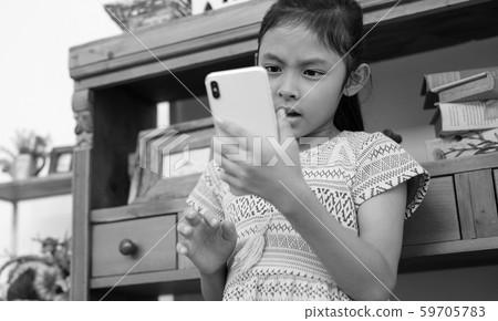 Child image of operating smartphone 59705783