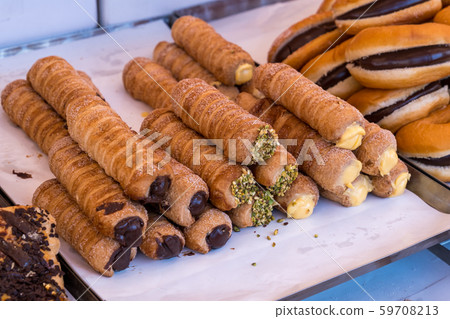 Cannoli italian cake on a shelf at market 59708213