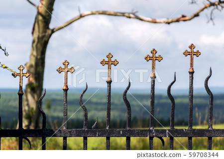 Beautiful small iron crossed fence decoration, graveyard gate with green woods, life and death Beautiful small iron crossed fence decoration, graveyard gate with green woods, life and death 59708344