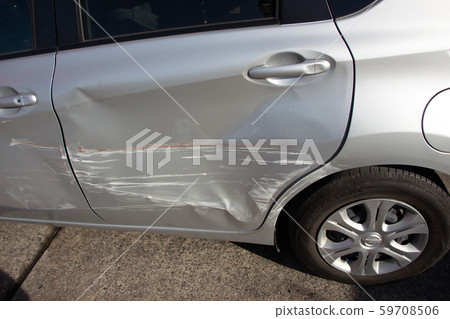 A car in an accident. 59708506