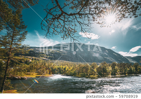 Kinsarvik, Hordaland, Norway. Kinso River In Hardangervidda Mountain Plateau. Sunlight Sunbeams Kinsarvik, Hordaland, Norway. Kinso River In Hardangervidda Mountain Plateau. Sunlight Sunbeams 59708919