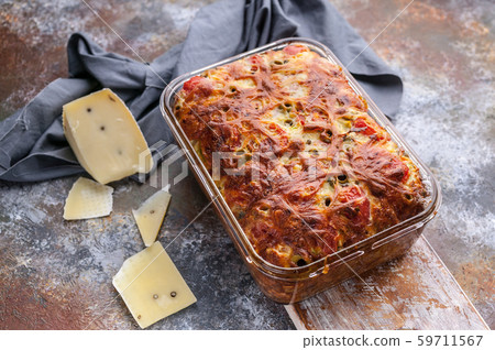 Close-up homemade cheese baked pie with olives Close-up homemade cheese baked pie with olives 59711567