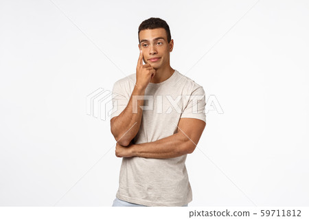 Annoyed and bothered arrogant man, smirk irritated look spaced out, touching face with finger, cant 59711812