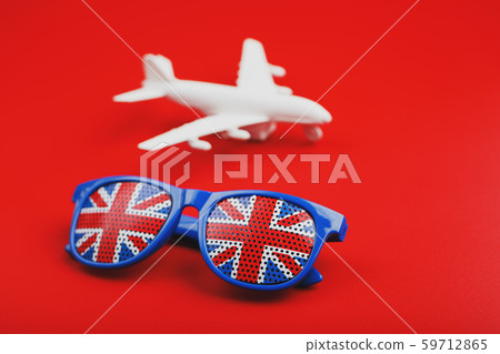 White airplane and sunglasses with the flag of the White airplane and sunglasses with the flag of the 59712865
