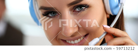 Beautiful brunette smiling call centre clerk at work Beautiful brunette smiling call centre clerk at work 59713212