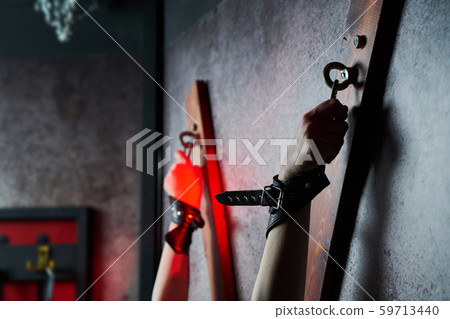 Sexy woman in handcuffs. Games for adults in the room BDSM. 59713440