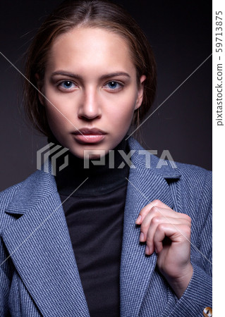 Portrait of a beautiful girl in a simple style in 59713875