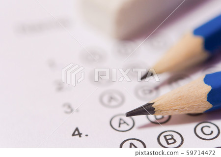Pencil and eraser on answer sheets or Standardized 59714472