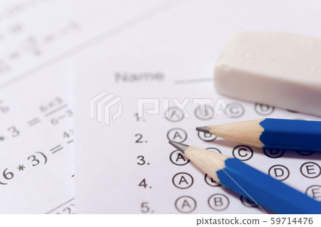 Pencil and eraser on answer sheets or Standardized Pencil and eraser on answer sheets or Standardized 59714476