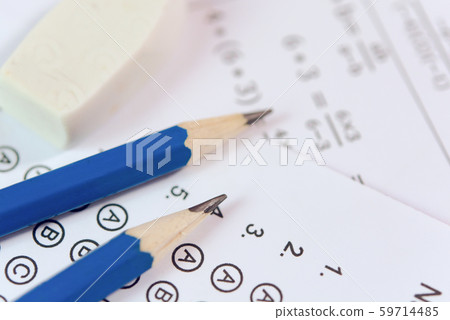 Pencil and eraser on answer sheets or Standardized Pencil and eraser on answer sheets or Standardized 59714485