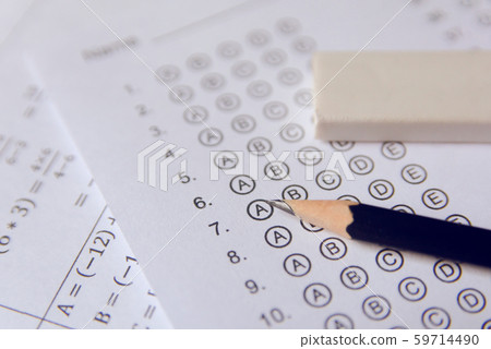 Pencil and eraser on answer sheets or Standardized Pencil and eraser on answer sheets or Standardized 59714490