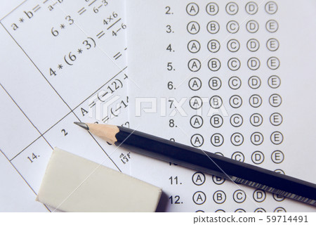 Pencil and eraser on answer sheets or Standardized Pencil and eraser on answer sheets or Standardized 59714491