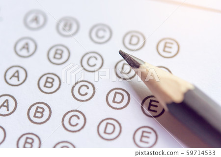 Pencil on answer sheets or Standardized test form Pencil on answer sheets or Standardized test form 59714533