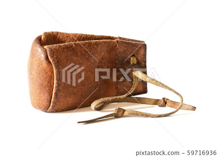 Old worn leather coin pouch isolated on white background Old worn leather coin pouch isolated on white background 59716936