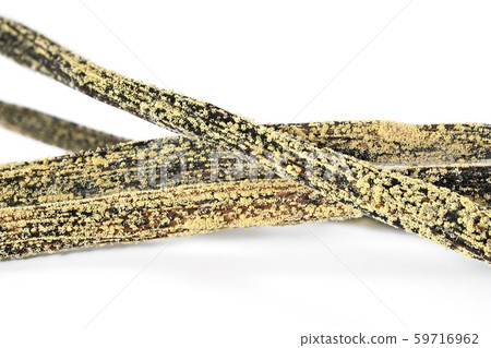 White yellow mould or mildew growing on vanilla sticks stored improperly in wet and cold fridge - 59716962