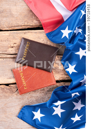 Satin flag of USA and two passports. 59718458