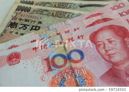 Chinese and Japanese banknotes 100 yuan bill and 10,000 yen bill Chinese and Japanese banknotes 100 yuan bill and 10,000 yen bill 59718503