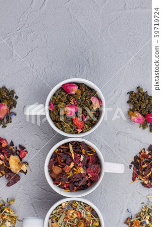 Assorted dry tea in cups, top view. Assorted dry tea in cups, top view. 59719724