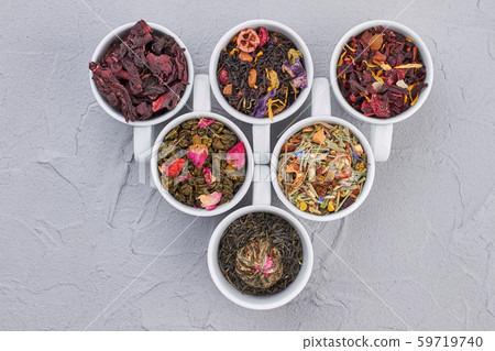 Flat lay composition with different types of dry tea leaves. Flat lay composition with different types of dry tea leaves. 59719740