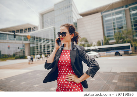 businesswoman in a summer city 59719886
