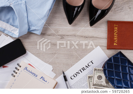 Office woman's flatlay on wooden table. Office woman's flatlay on wooden table. 59720265