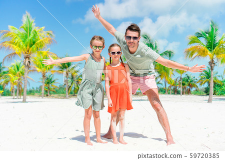 Father and kids enjoying beach summer vacation Father and kids enjoying beach summer vacation 59720385