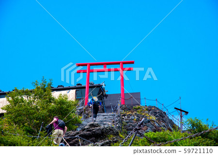 Fuji Seventh Station, Torii-so red torii and climbers 59721110