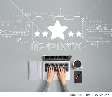 Five star rating with person using laptop Five star rating with person using laptop 59724053