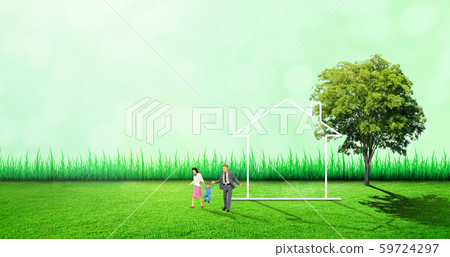 Family and white home on green grass meadow field with green natural and sunlight in background. 59724297