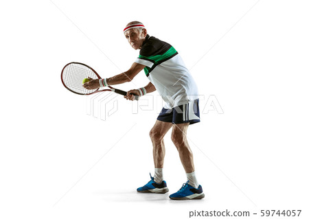Senior man playing tennis in sportwear isolated on white background 59744057