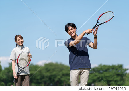 Tennis, blue sky, couple image 59744913