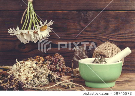 Drying and harvesting of medicinal herbs, homeopathy and alternative medicine concept Drying and harvesting of medicinal herbs, homeopathy and alternative medicine concept 59745878