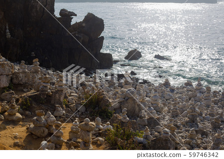 Beach with stacks of rocks called a cairns. Peniche Portugal Beach with stacks of rocks called a cairns. Peniche Portugal 59746342