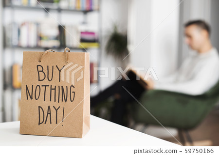 text buy nothing day in a shopping bag. text buy nothing day in a shopping bag. 59750166